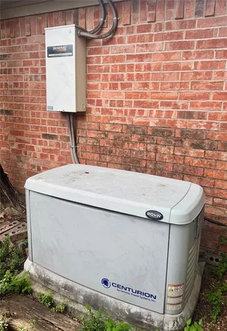 an aerial view of a house with swimming pool and garden