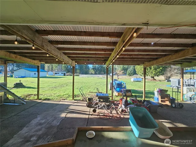 a view of a swimming pool with a patio