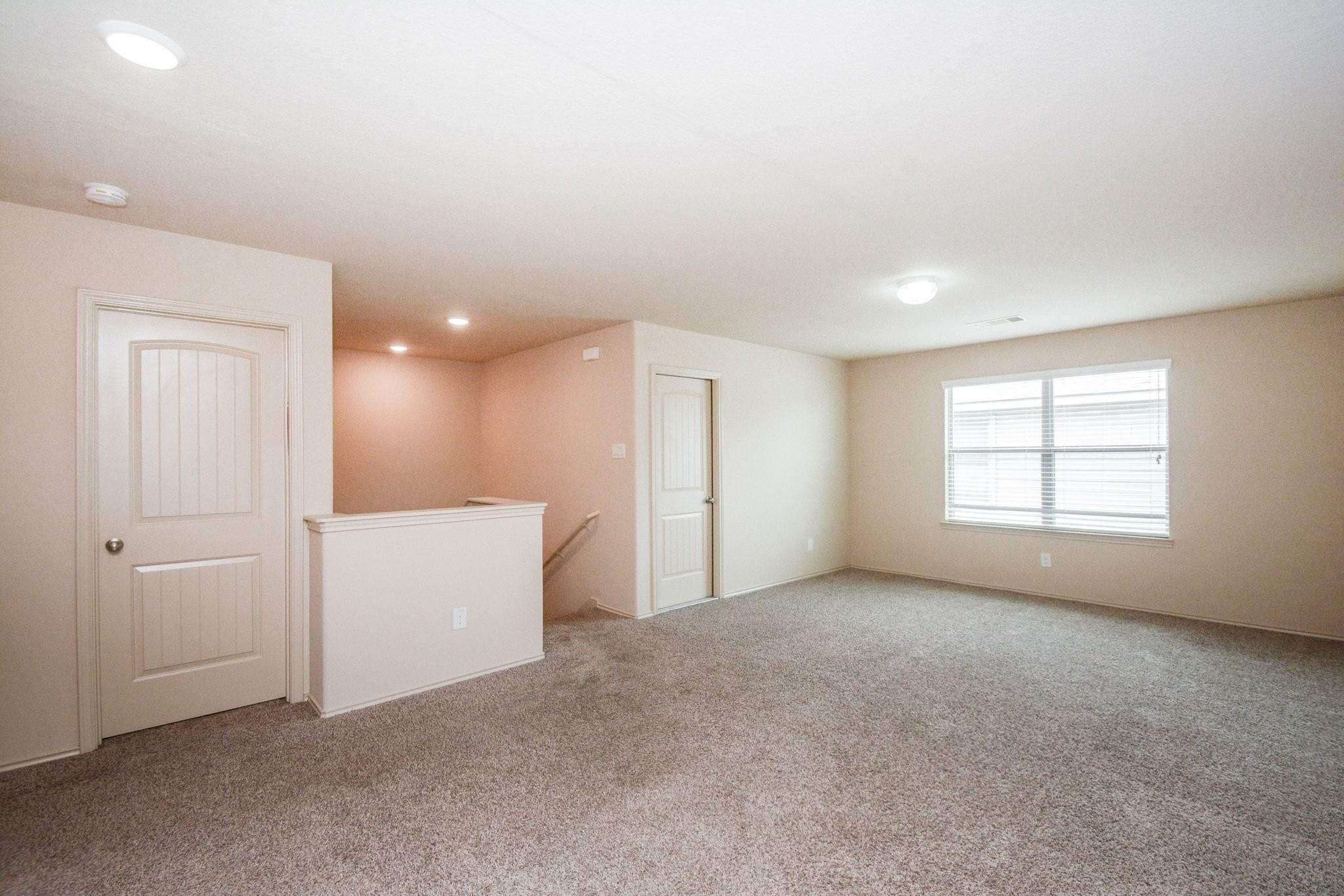 2003 Treasure Mountain Drive Spring, TX 77388 - Photo 16 of 20 an empty room with windows and closet