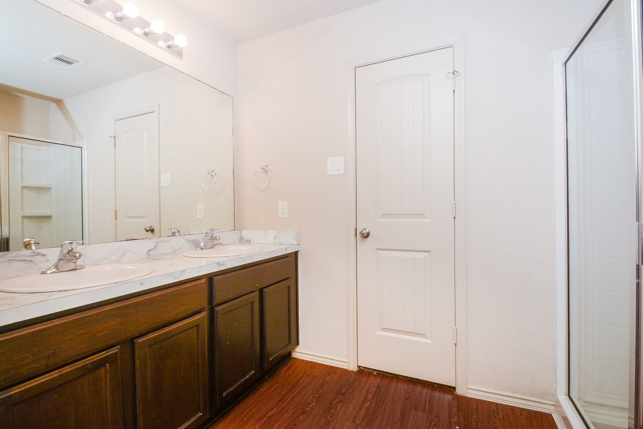 2003 Treasure Mountain Drive Spring, TX 77388 - Photo 17 of 20 a bathroom with a double vanity sink and mirror