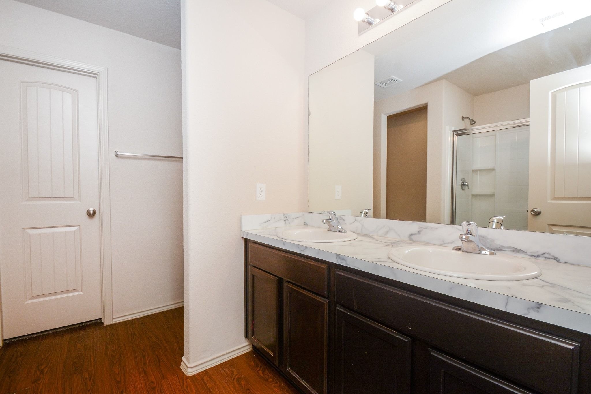 2003 Treasure Mountain Drive Spring, TX 77388 - Photo 18 of 20 a bathroom with a granite countertop sink and a mirror