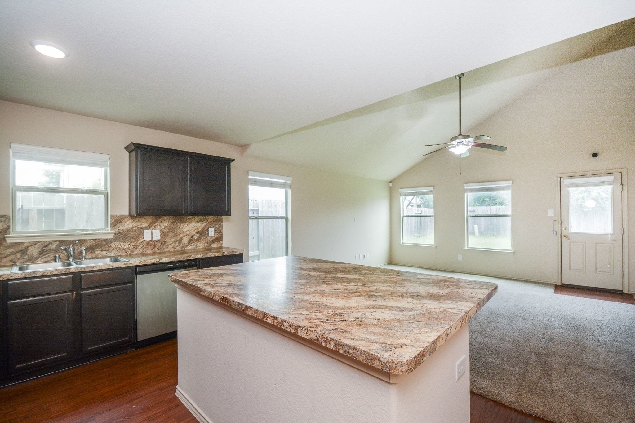 2003 Treasure Mountain Drive Spring, TX 77388 - Photo 5 of 20 a kitchen with sink stove and granite counter top