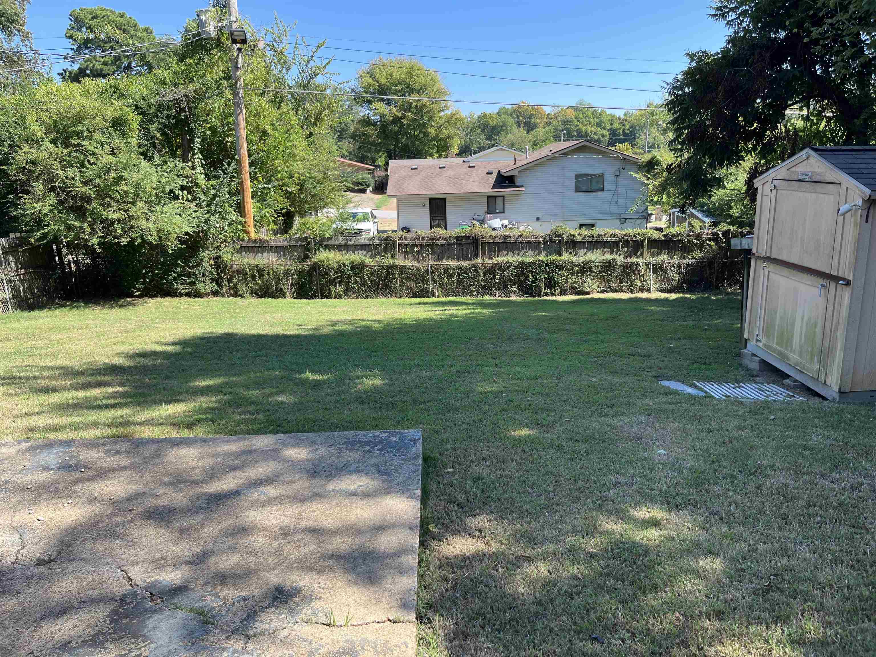 3492 Neely Road Memphis, TN 38109 - Photo 12 of 15 a front view of a house with a yard
