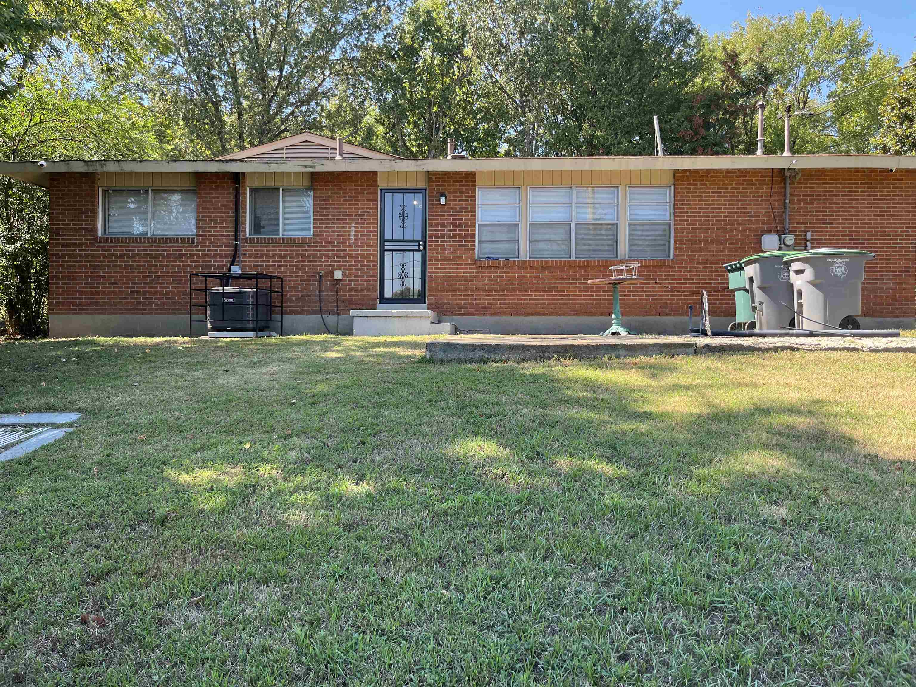 3492 Neely Road Memphis, TN 38109 - Photo 13 of 15 a view of a backyard with table and chairs