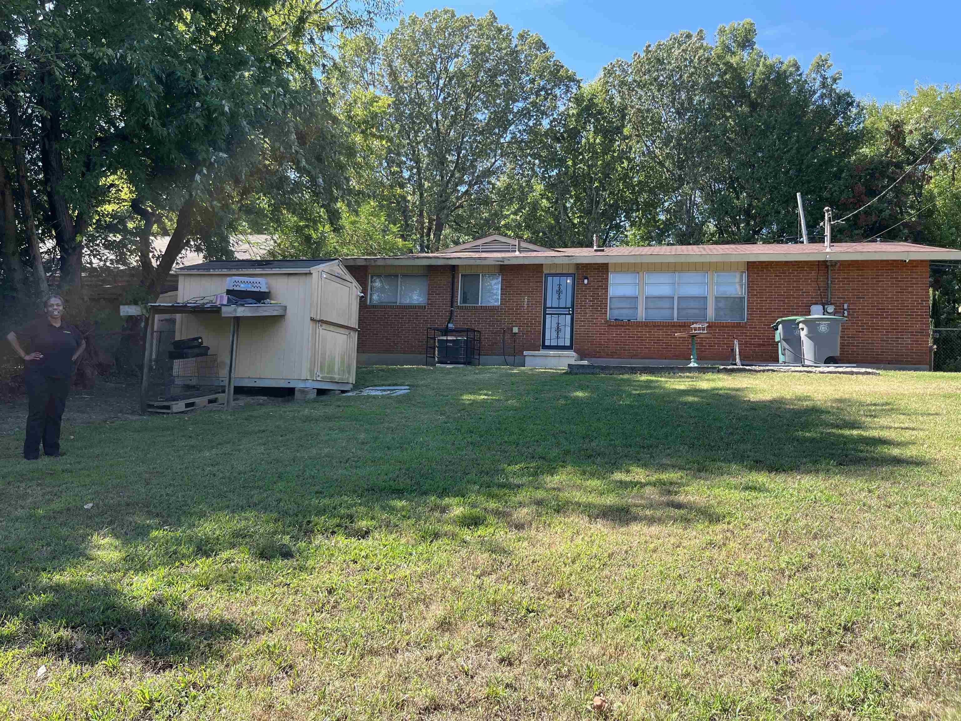 3492 Neely Road Memphis, TN 38109 - Photo 14 of 15 a view of a house with a yard and sitting area
