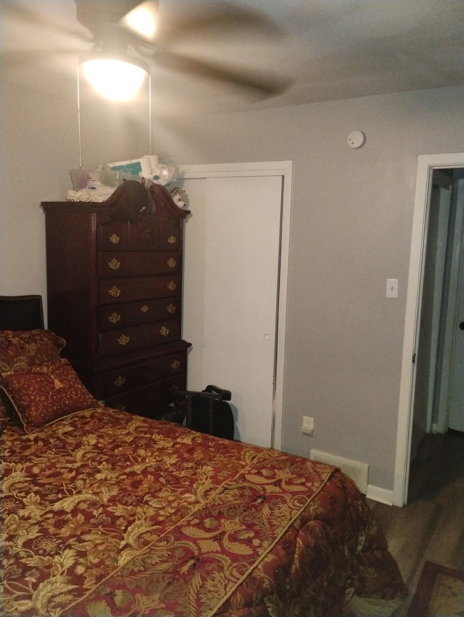 3492 Neely Road Memphis, TN 38109 - Photo 7 of 15 a bedroom with a bed and a dresser