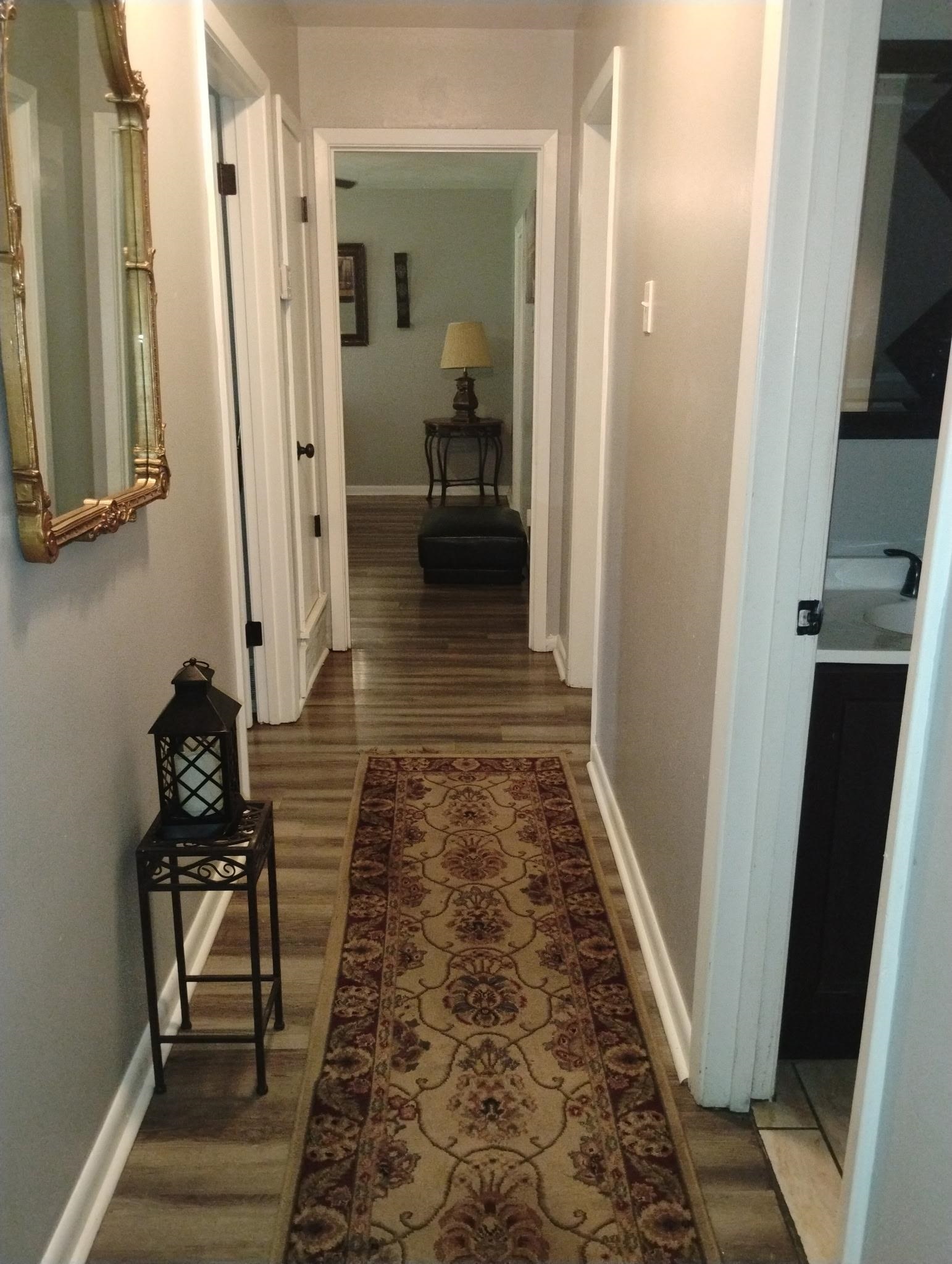 3492 Neely Road Memphis, TN 38109 - Photo 10 of 15 a bathroom with sink and mirror