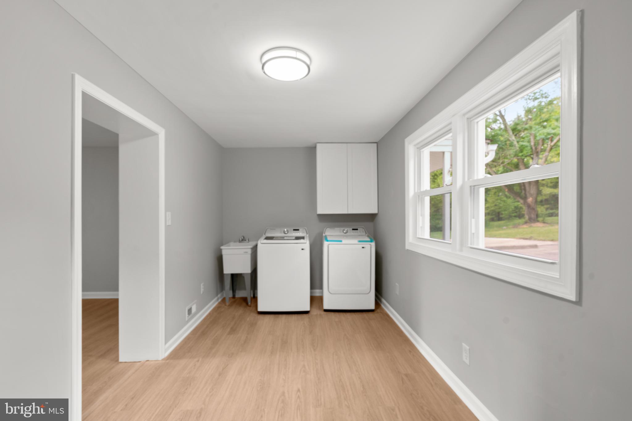 7946 Max Blobs Park Road Hanover, MD 21076 - Photo 18 of 47 Laundry room/hobby room/sunroom