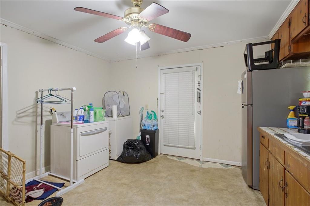913 Old Noonday Sch House Road Marietta, GA 30066 - Photo 11 of 42 a room with storage and utility