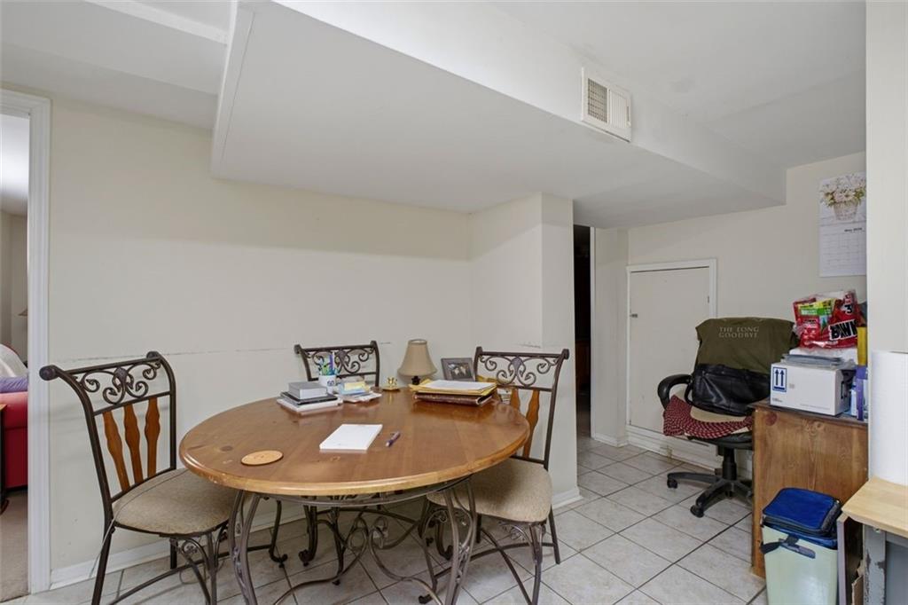 913 Old Noonday Sch House Road Marietta, GA 30066 - Photo 18 of 42 a view of a dining room with furniture