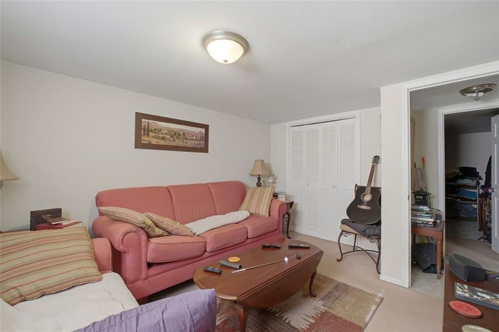 913 Old Noonday Sch House Road Marietta, GA 30066 - Photo 22 of 42 a living room with furniture and a couch