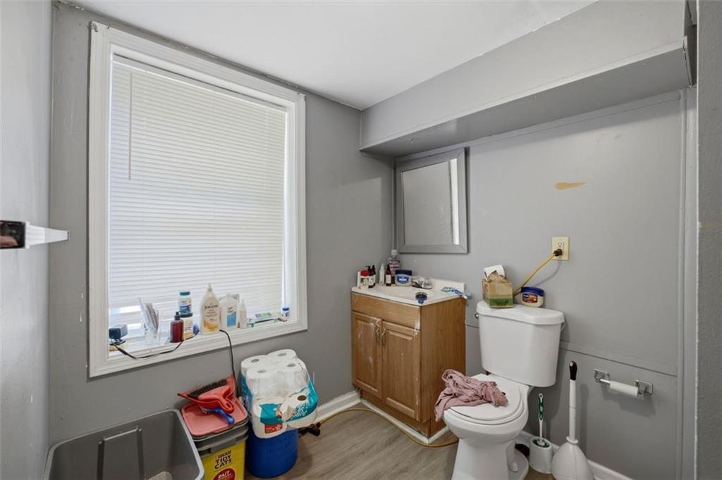913 Old Noonday Sch House Road Marietta, GA 30066 - Photo 27 of 42 a room with a baby crib and a window
