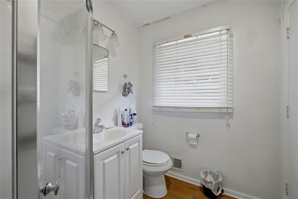 913 Old Noonday Sch House Road Marietta, GA 30066 - Photo 34 of 42 a bathroom with a sink toilet and shower