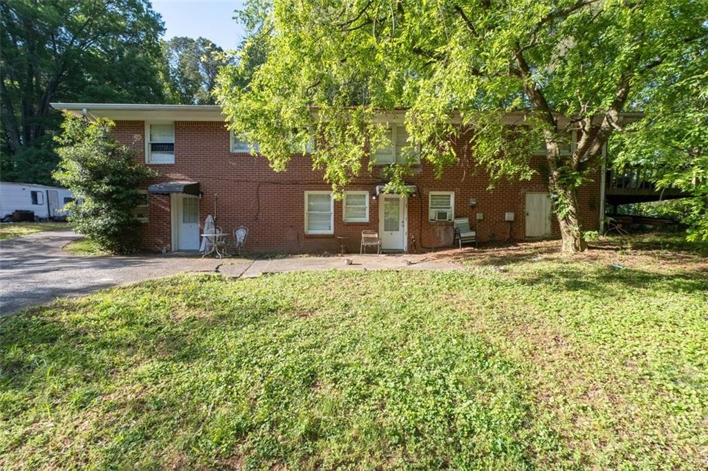 913 Old Noonday Sch House Road Marietta, GA 30066 - Photo 39 of 42 front view of a house with a yard