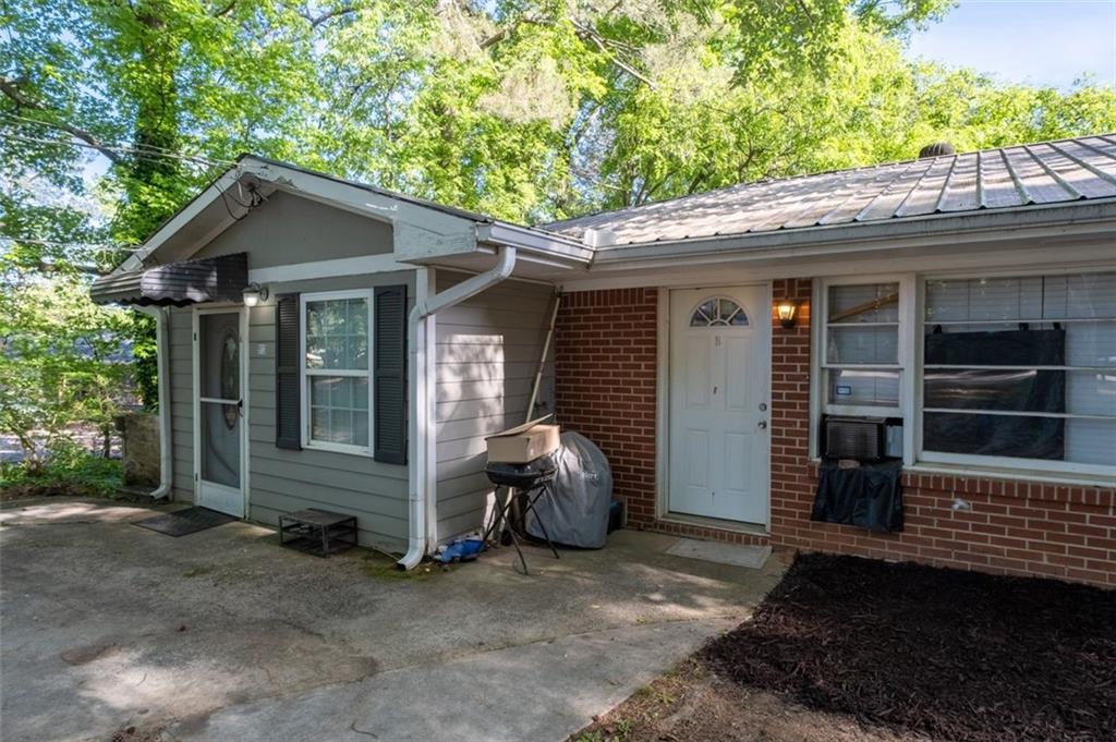 913 Old Noonday Sch House Road Marietta, GA 30066 - Photo 4 of 42 a view of a house with a yard and potted plants