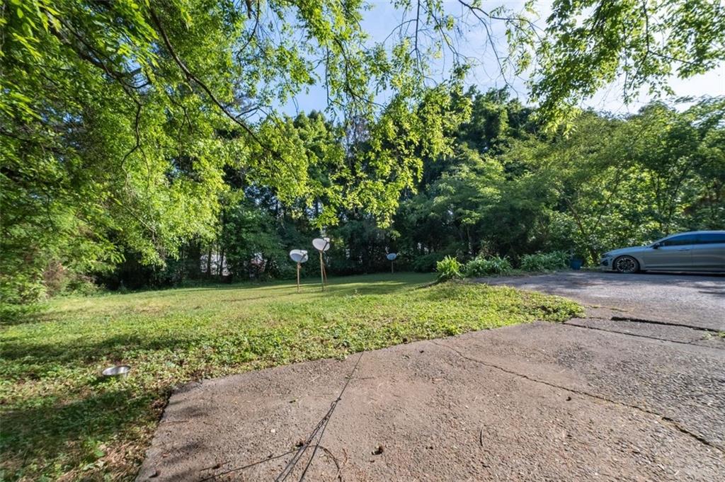 913 Old Noonday Sch House Road Marietta, GA 30066 - Photo 41 of 42 a view of outdoor space with deck and yard