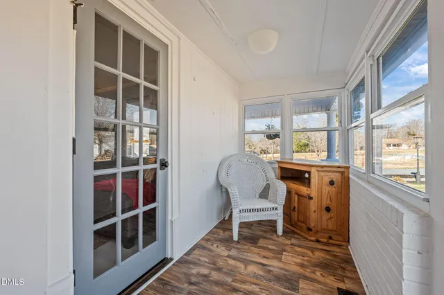 a living room with furniture and window
