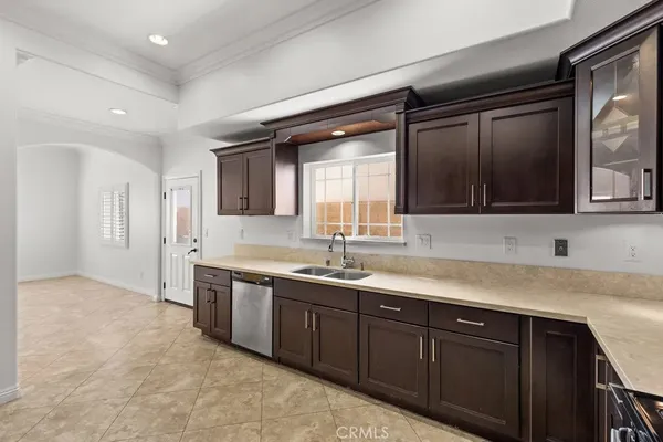 a kitchen with a sink and cabinets