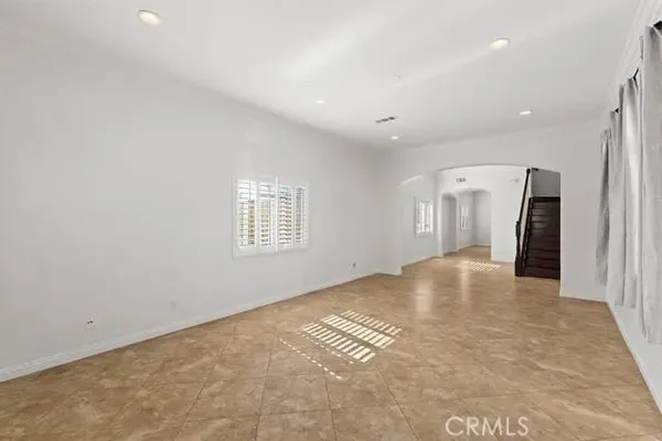 an empty room with a natural light