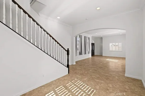 a view of a hallway with stairs