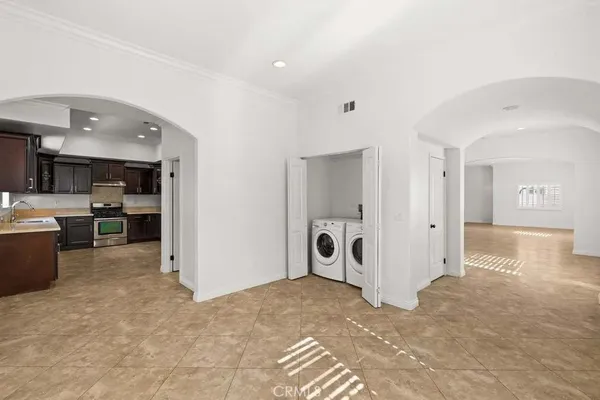 a view of a kitchen with a sink