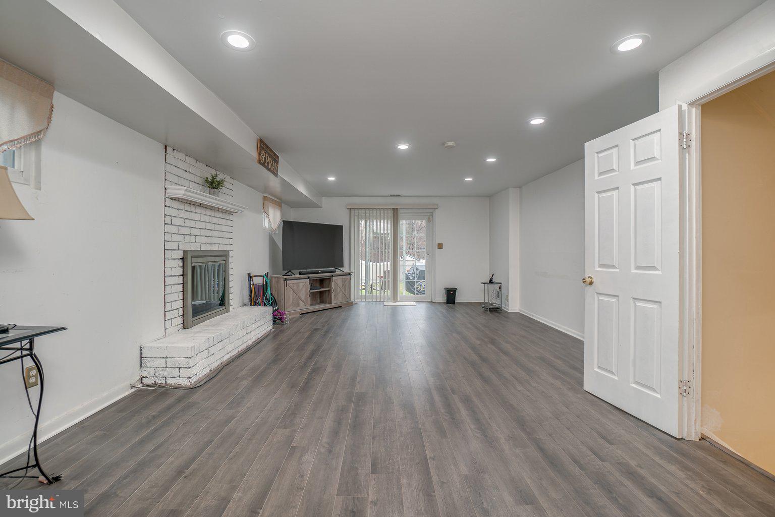 4643 Hawksbury Road Baltimore, MD 21208 - Photo 31 of 42 Family room with sliders to back yard