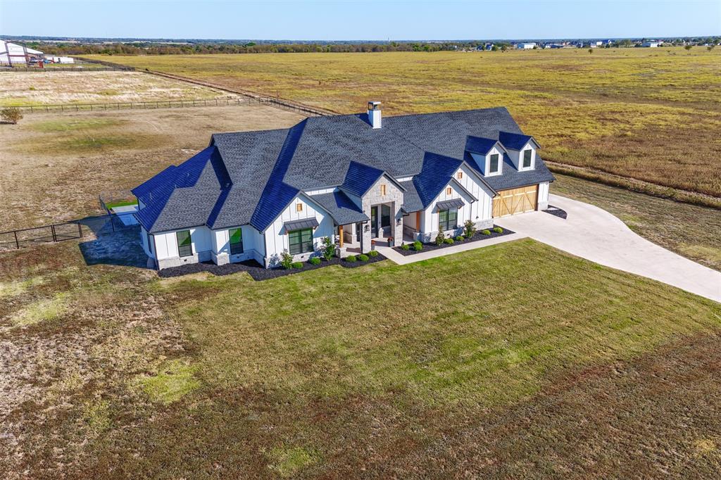 1810 Jc Maples Road Gunter, TX 75058 - Photo 16 of 27 a view of a lake with a big yard