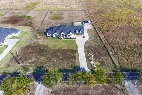 a view of a lake with a big yard
