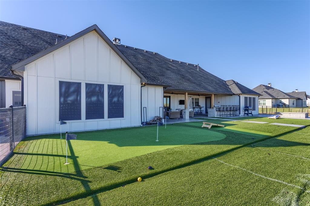 1810 Jc Maples Road Gunter, TX 75058 - Photo 2 of 27 a view of house with a big yard