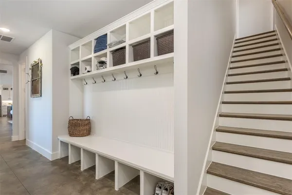 a view of a hallway with workspace