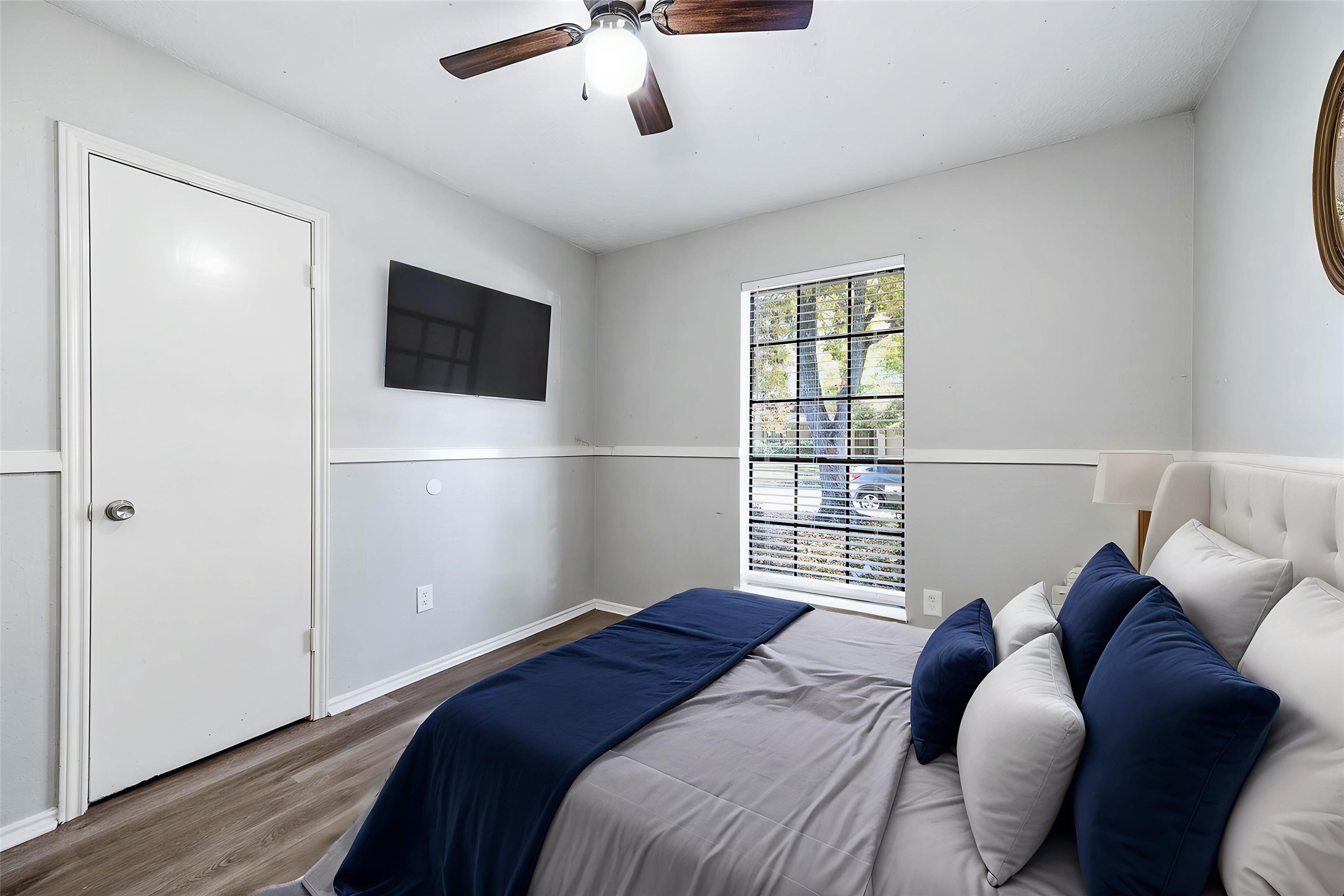 21402 Golden Dove Drive Spring, TX 77388 - Photo 16 of 29 a bedroom with a large bed and a flat screen tv