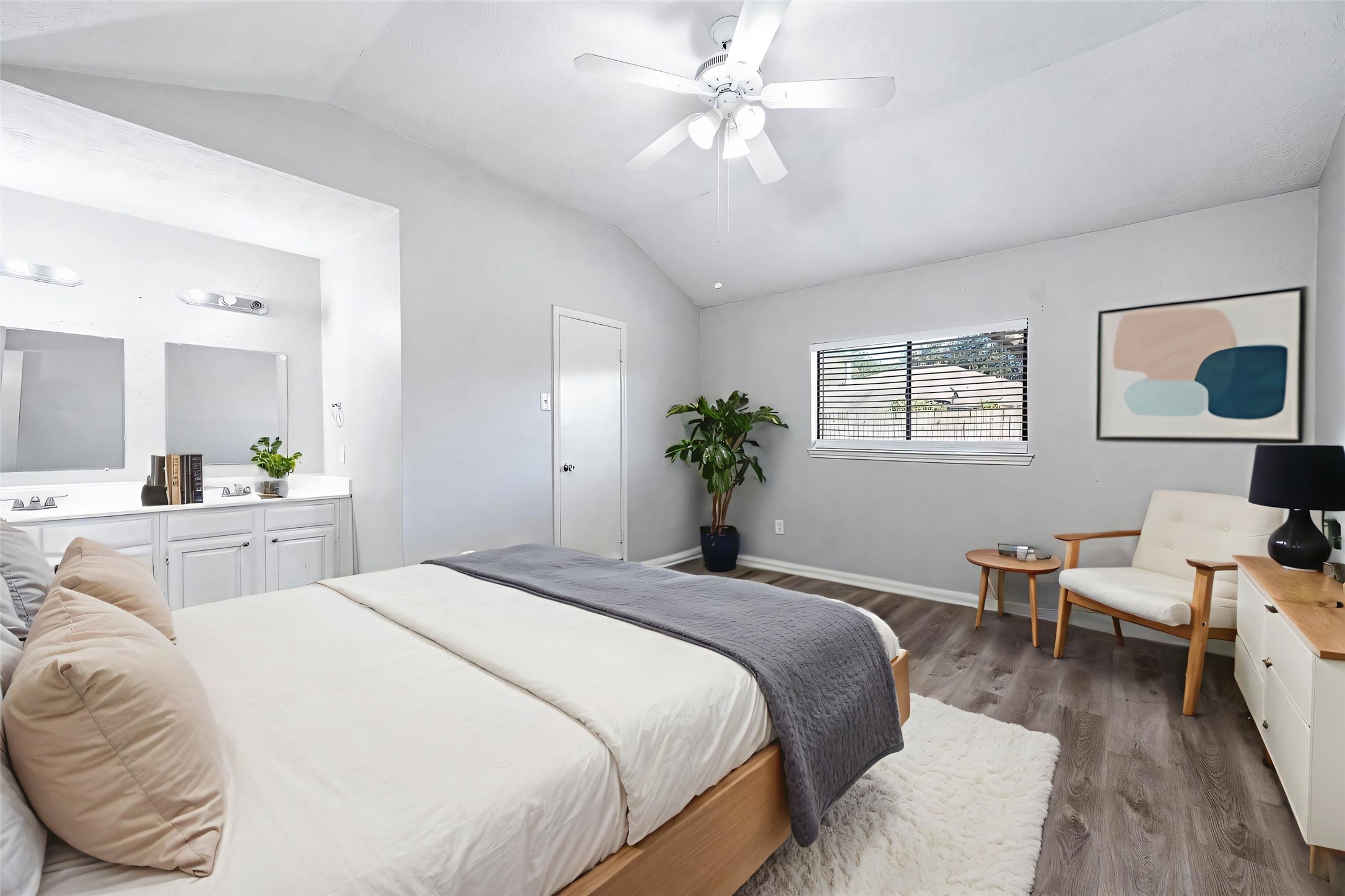 21402 Golden Dove Drive Spring, TX 77388 - Photo 17 of 29 a bedroom with a bed and wooden floor