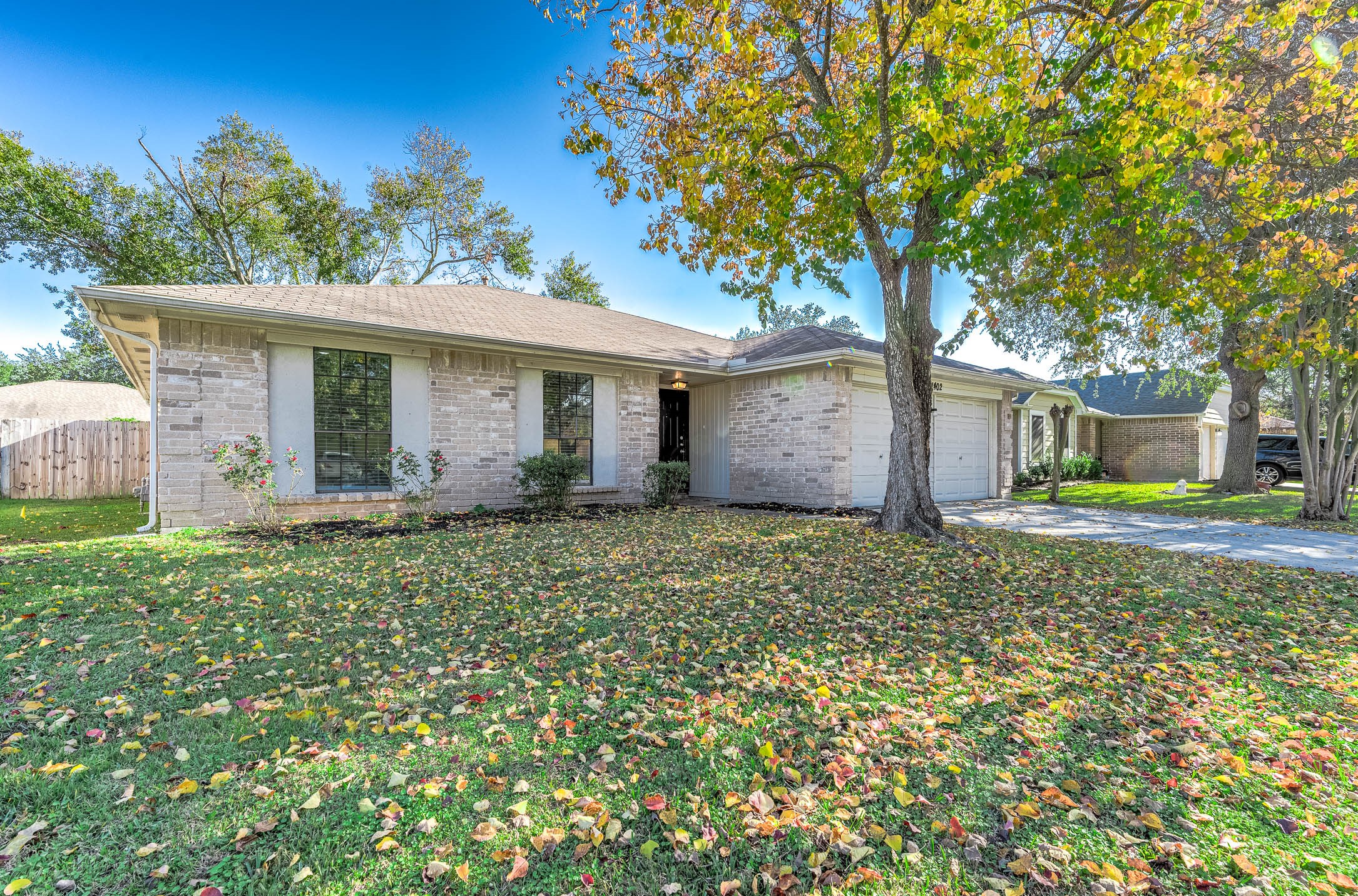 21402 Golden Dove Drive Spring, TX 77388 - Photo 6 of 29 a backyard of a house with lots of green space