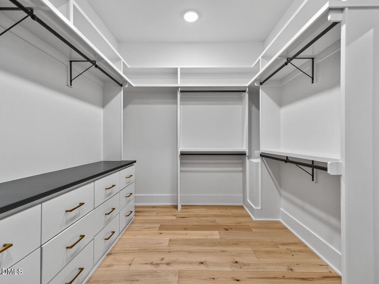 1309 Montvale Ridge Drive Cary, NC 27519 - Photo 16 of 24 a view of an empty walk in closet