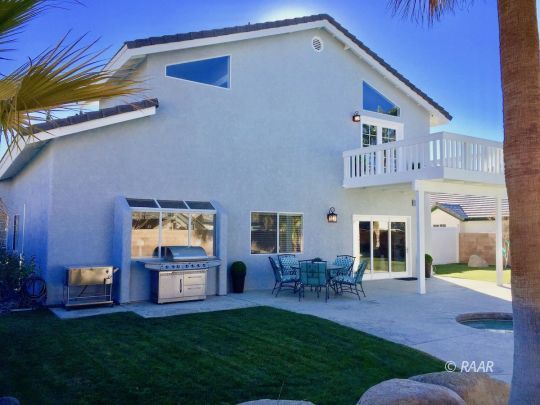 1108 Judy Way Ridgecrest, CA 93555 - Photo 33 of 35 a view of an house with backyard porch and furniture