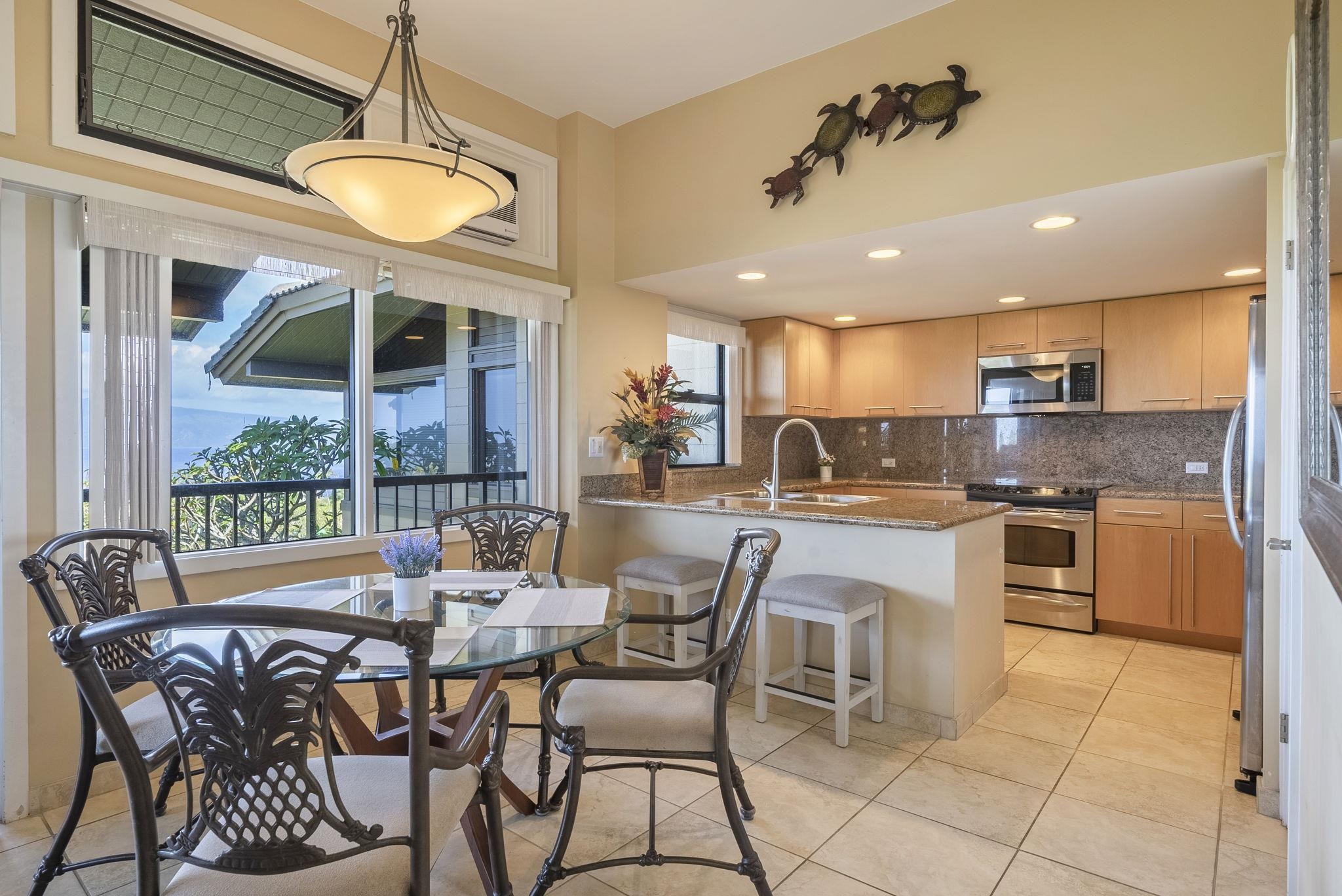 100 Ridge Road, Unit 2721 Lahaina, HI 96761 - Photo 15 of 16 a view of a dining room with furniture window and outside view