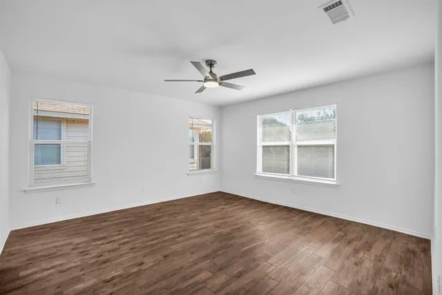 a bathroom with a tub a sink and a shower