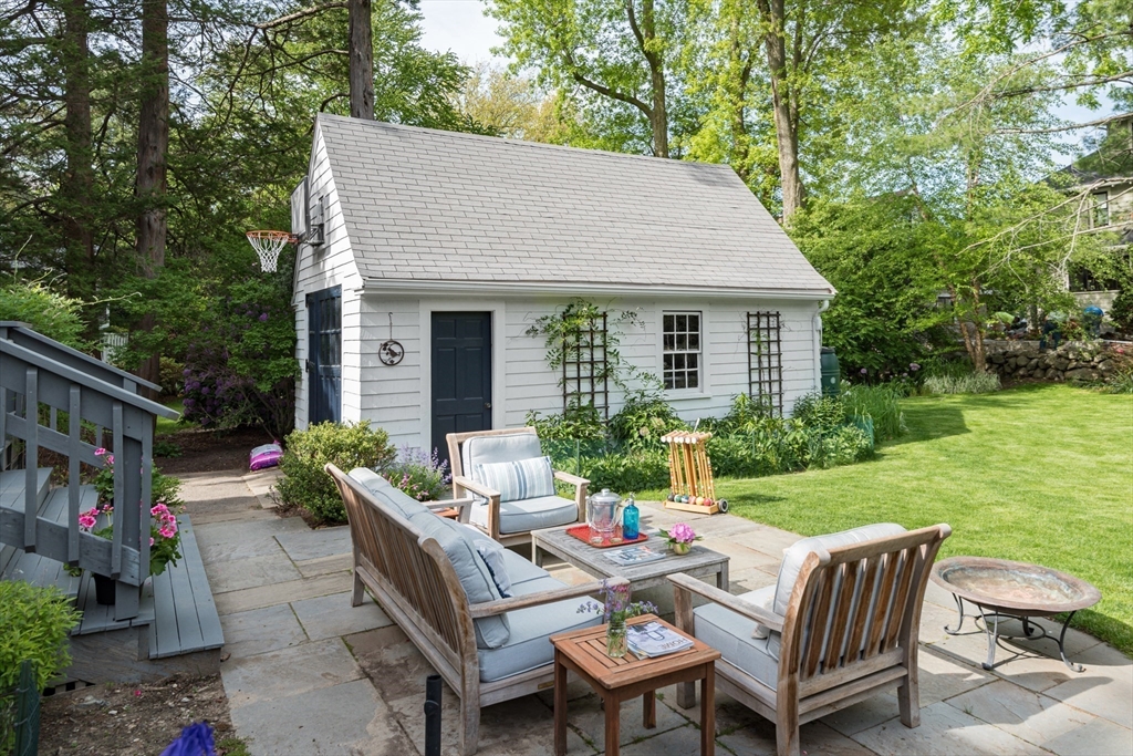40 Stone Road Belmont, MA 02478 - Photo 42 of 42 a view of backyard of house with seating space
