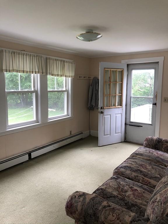 35 Adams Street Norwood, MA 02062 - Photo 14 of 40 a bedroom with bed and window