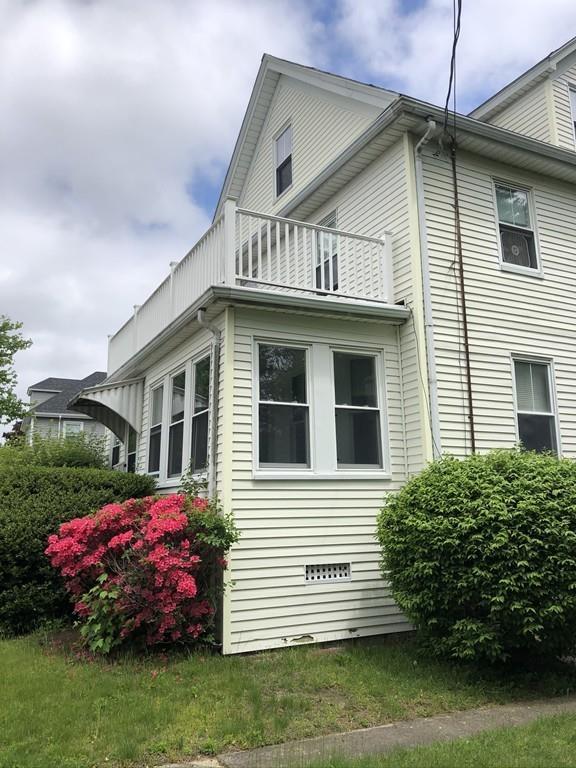 35 Adams Street Norwood, MA 02062 - Photo 3 of 40 a front view of a house with a garden
