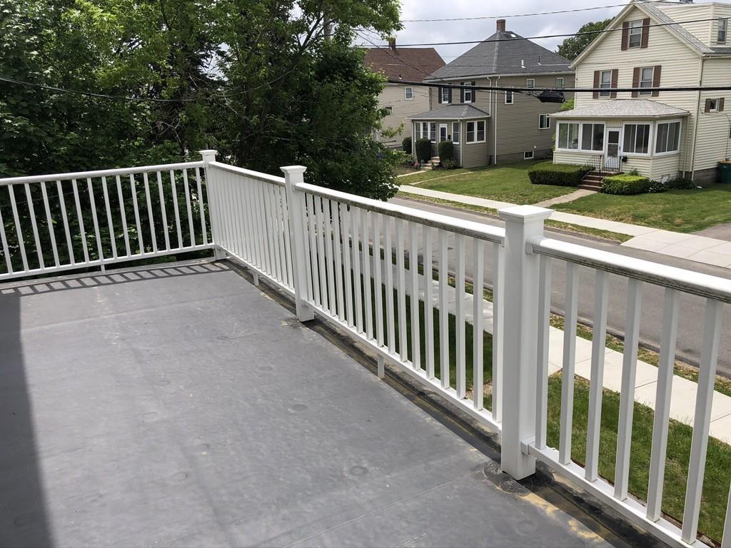 35 Adams Street Norwood, MA 02062 - Photo 33 of 40 a view of a house with a deck