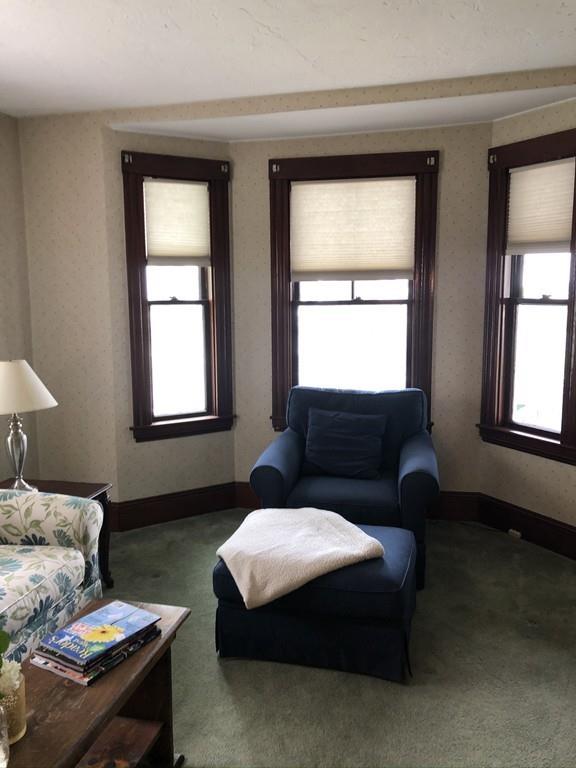 35 Adams Street Norwood, MA 02062 - Photo 9 of 40 a living room with furniture and a window