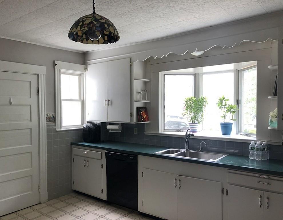 35 Adams Street Norwood, MA 02062 - Photo 10 of 40 a kitchen with a sink and window