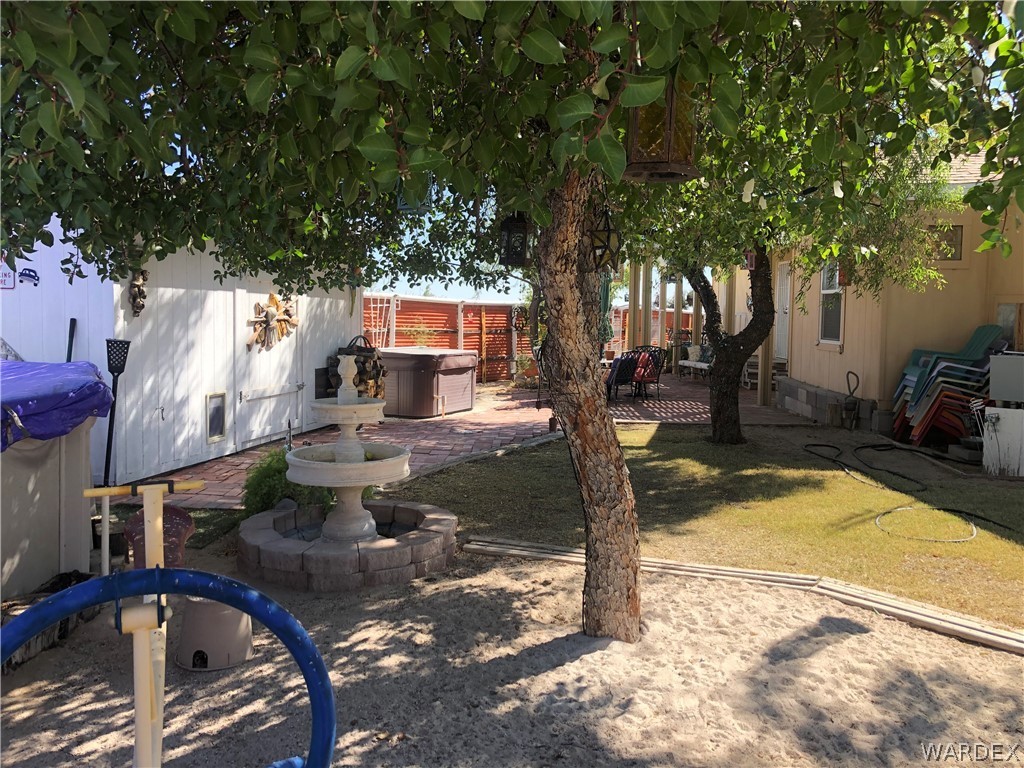 3500 Aztec Road Golden Valley, AZ 86413 - Photo 21 of 23 a view of a patio with swimming pool