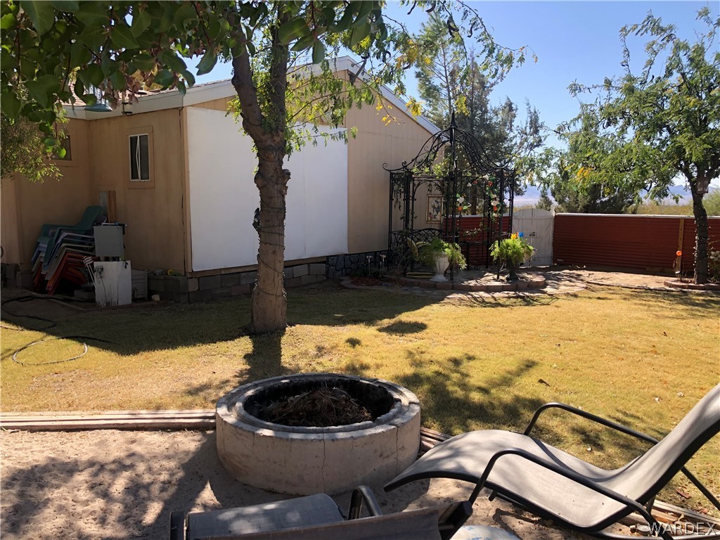 3500 Aztec Road Golden Valley, AZ 86413 - Photo 22 of 23 a view of an outdoor space with sitting area
