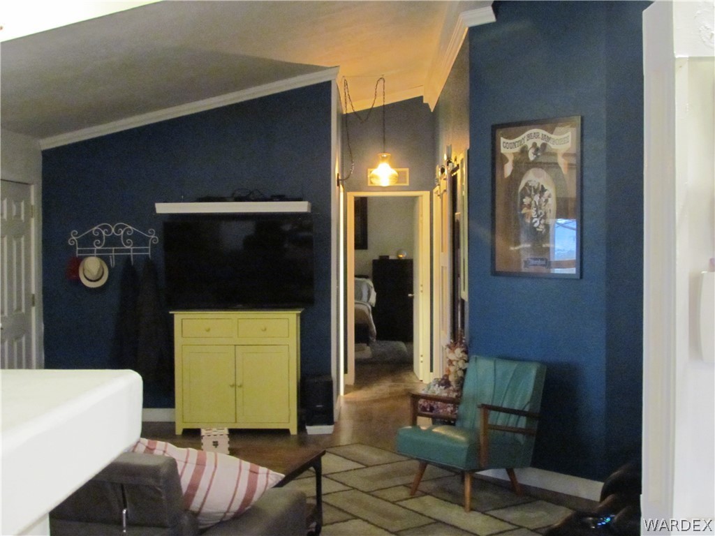 3500 Aztec Road Golden Valley, AZ 86413 - Photo 8 of 23 a living room with furniture and a window
