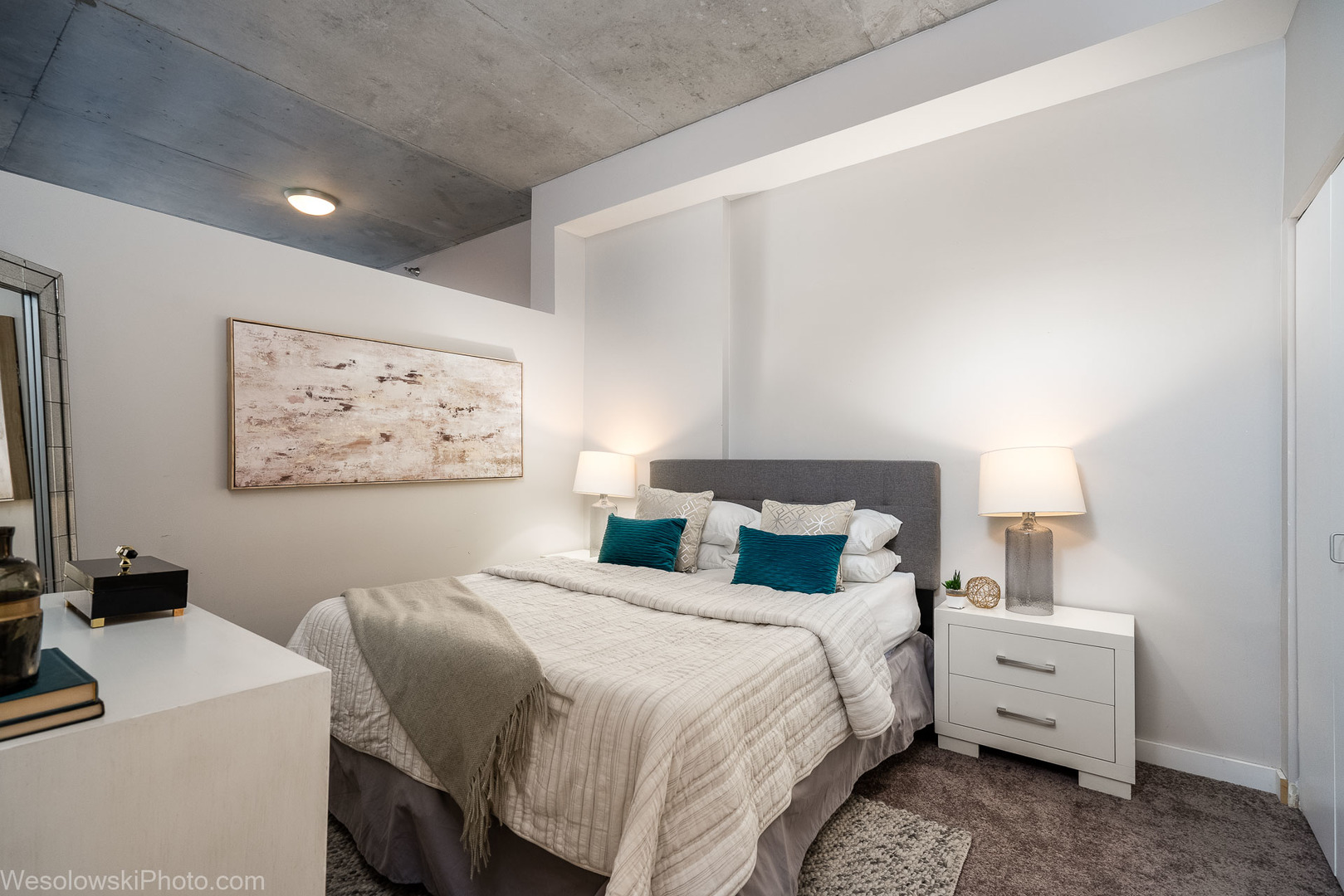 235 West Van Buren Street, Unit 2417 Chicago, IL 60607 - Photo 8 of 22 a bedroom with a bed and a desk