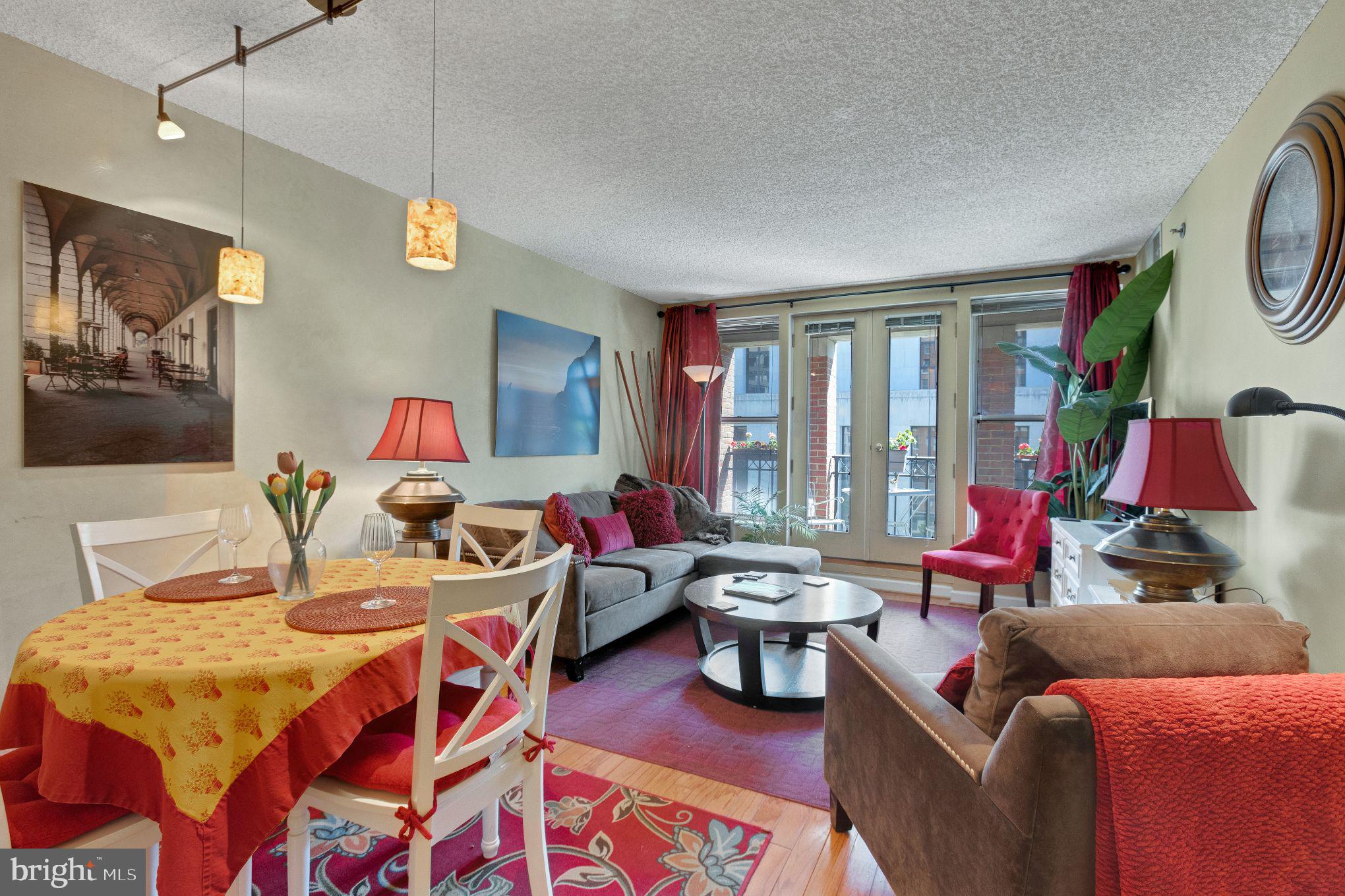 a theatre with furniture and wooden floor