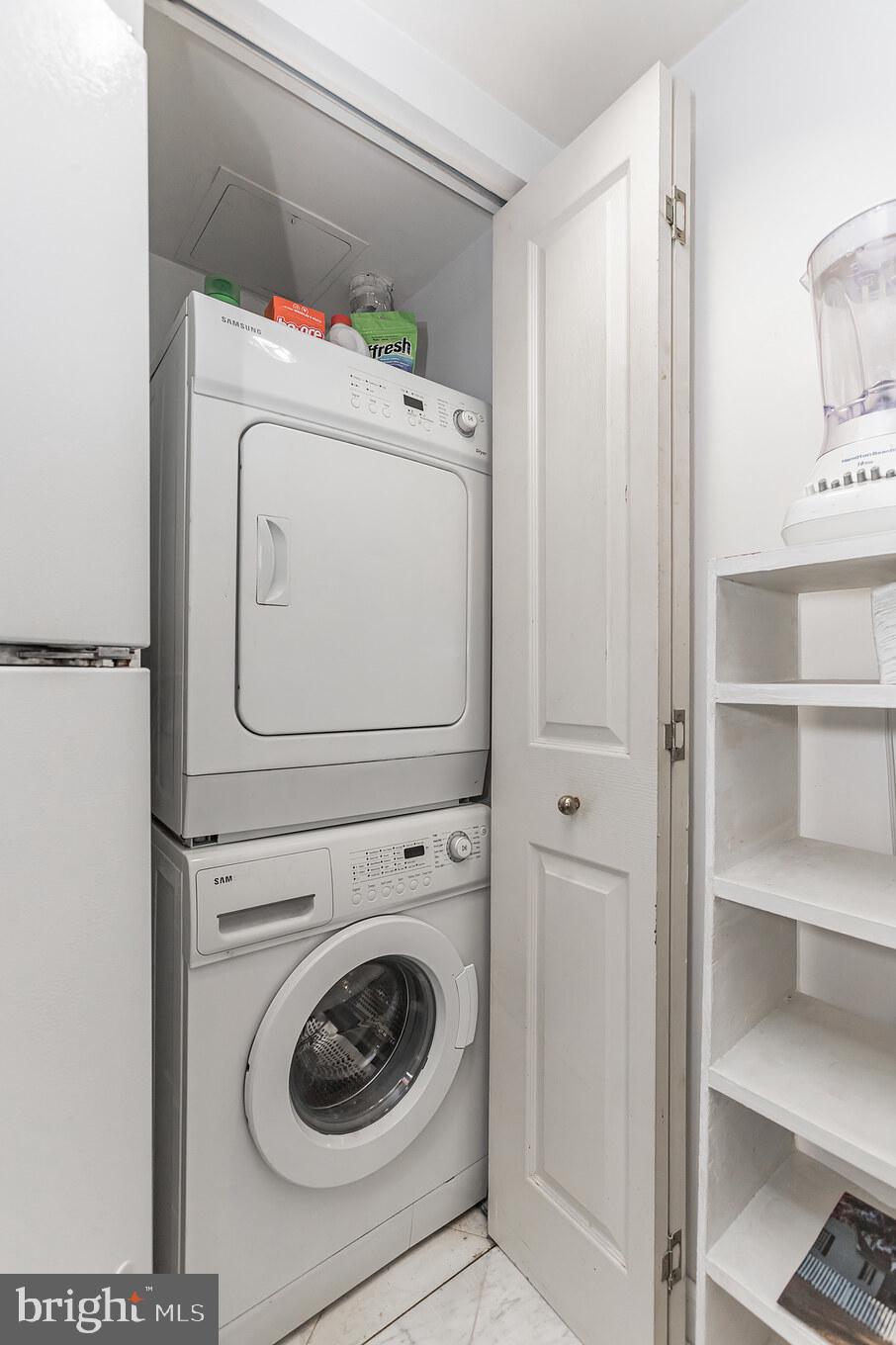 601 Pennsylvania Avenue Northwest, Unit 705 Washington, DC 20004 - Photo 16 of 29 a utility room with dryer and washer
