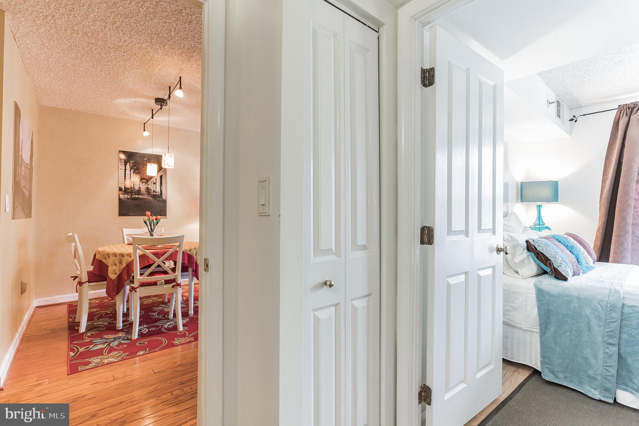 601 Pennsylvania Avenue Northwest, Unit 705 Washington, DC 20004 - Photo 23 of 29 a living room with furniture and wooden floor